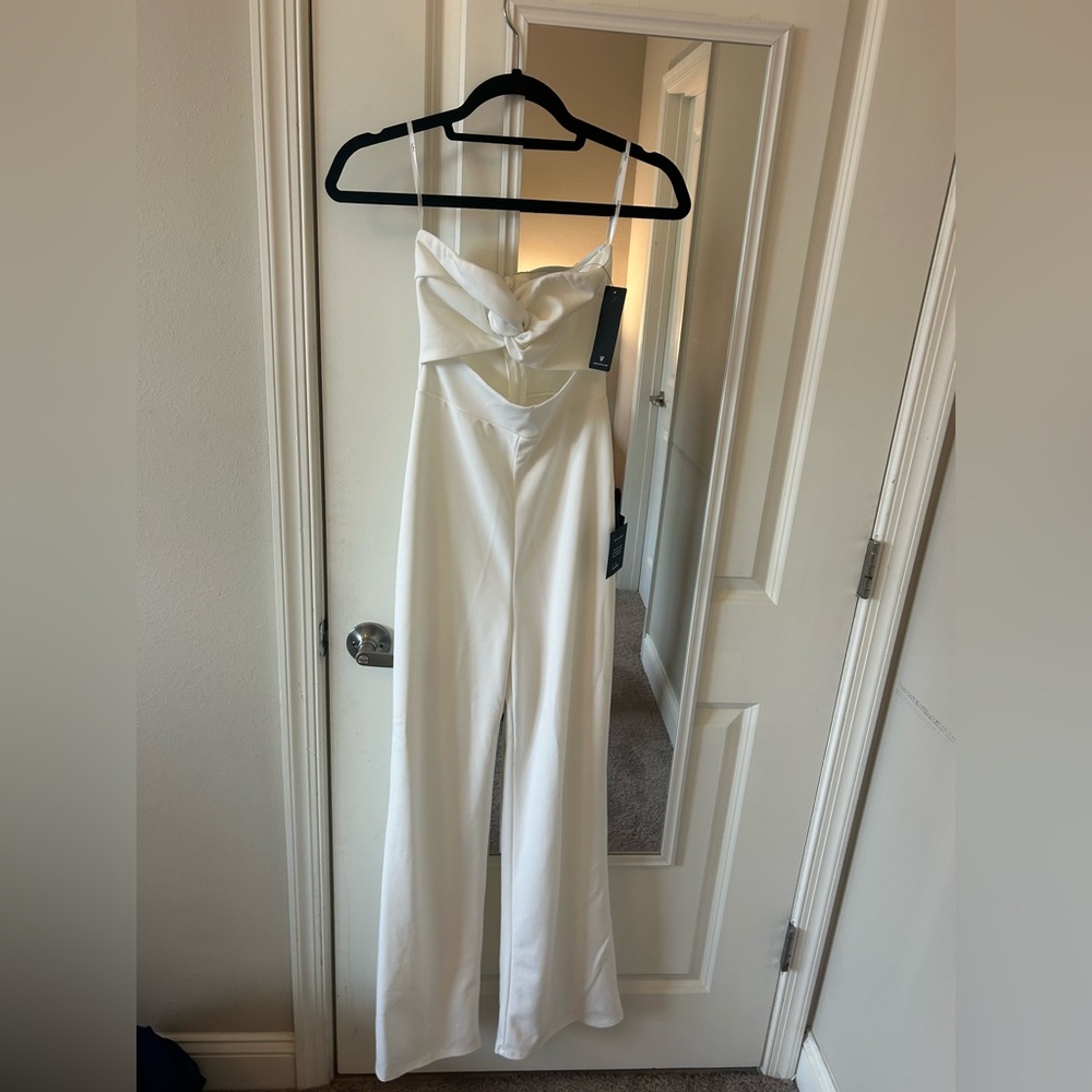 Lulus 
All that she wants white strapless cutout straight leg jumpsuit 
Size: XS